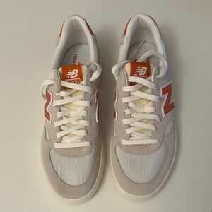 New Balance Cream and Red Sneakers